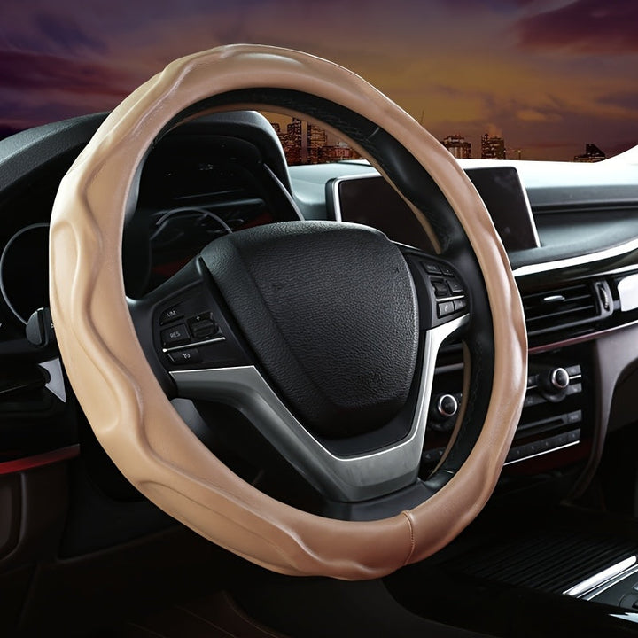 Durable universal PU leather steering wheel cover offers non-slip protection & easy comfort for daily driving.