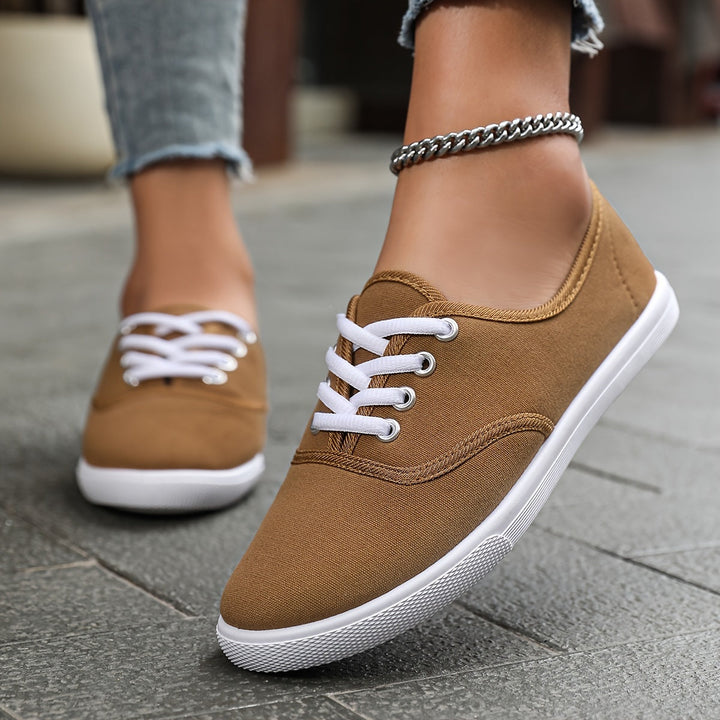 Fashion flats: Women's comfortable low-top lace-up casual shoes for everyday elegance.
