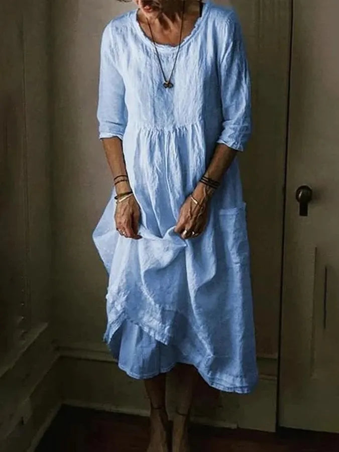 Elegant women's flowy maxi dress in a beautiful color, perfect for summer casual or chic events.