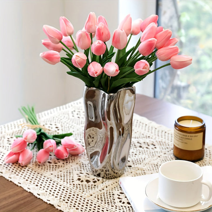 Set of 10 realistic artificial tulips in vibrant orange, white, and pink for home or wedding decor.