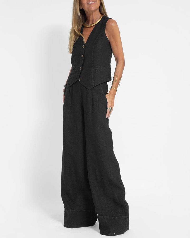 Elegant women's co-ord set: sleeveless vest top and fashionable wide leg pants for spring.