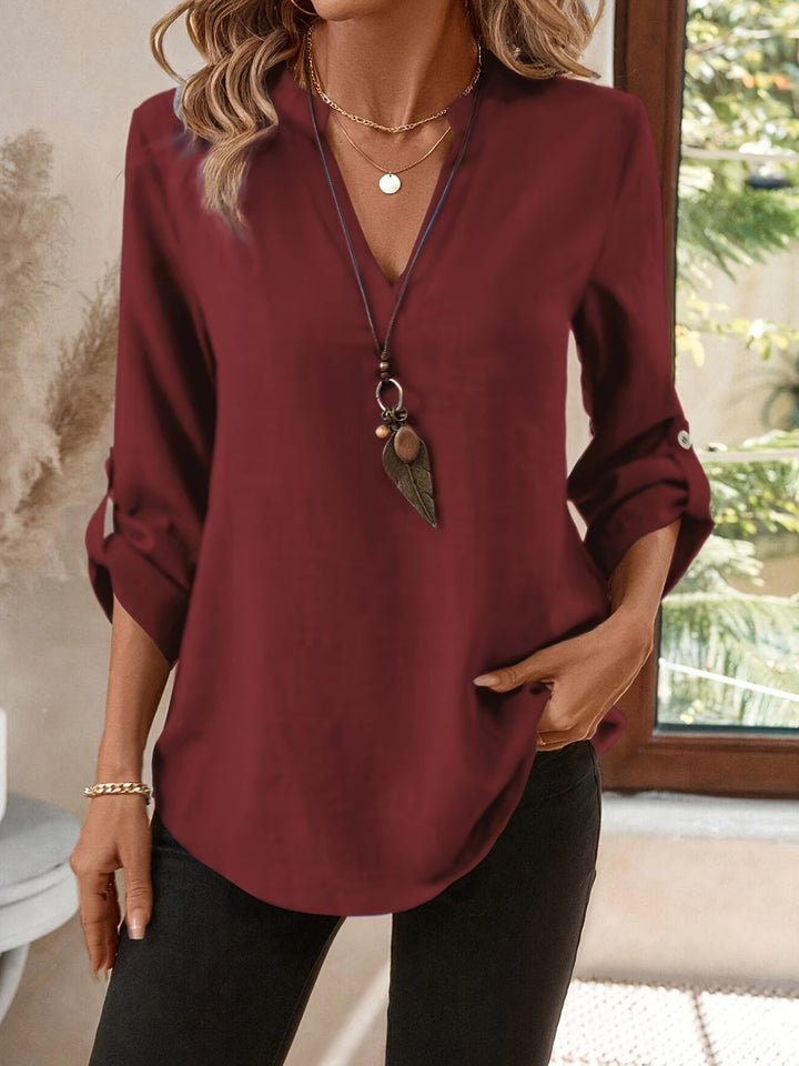 Casual women's long sleeve V-neck shirt, a comfortable and elegant classic everyday top.