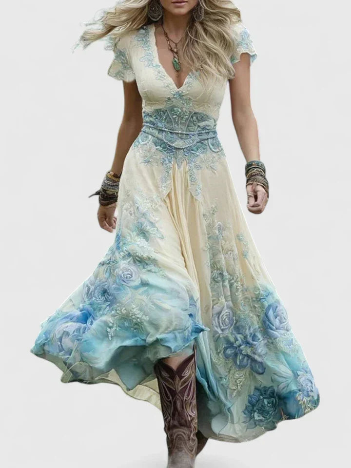 Comfortable summer maxi dress for women, featuring a beautiful floral print, V-neck, & short sleeves.