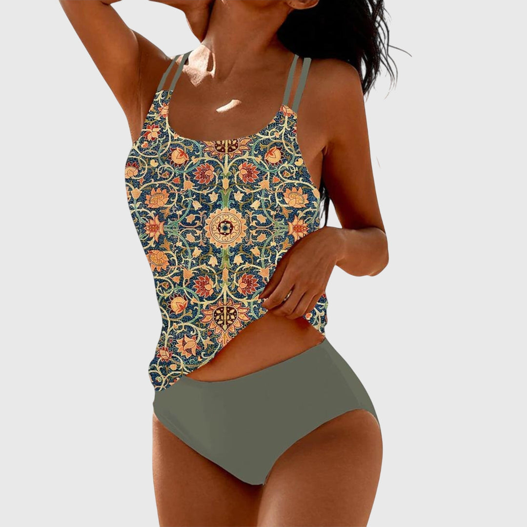 Vibrant printed strappy tankini swimsuit for women, perfect for summer beach vacations & resortwear.