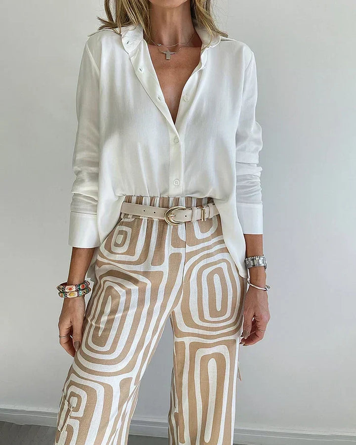 Comfortable gray two-piece blouse & trousers set for women. Chic geometric print, perfect for daily wear.