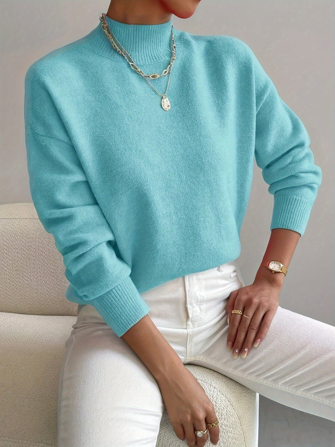 Warm knitted high neck pullover, a must-have for winter fashion.