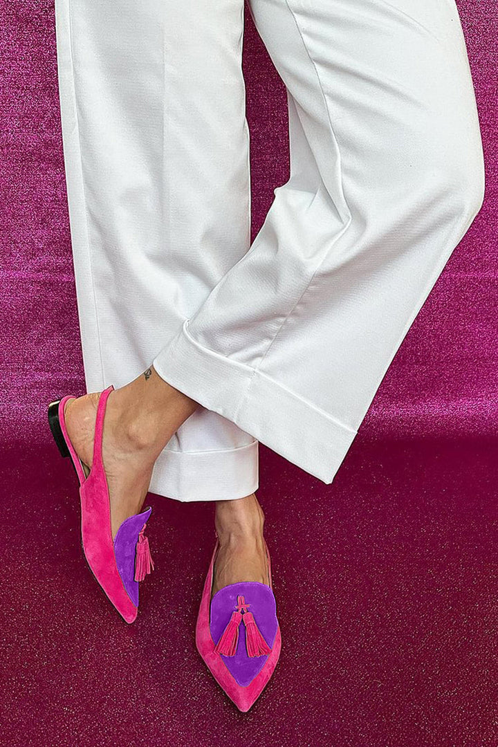 Vibrant women's fringe ballerina flats. Elegant colorful casual shoes with comfortable ankle strap. Fashion footwear.