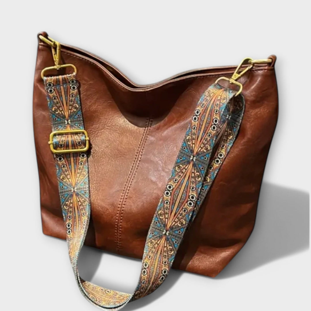 Women's elegant vintage faux leather shoulder bag, perfect for everyday classic style and fashion.