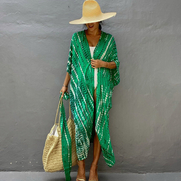 Stylish women's vacation outfit, glamorous sun protection beach cover up, one size fits all.