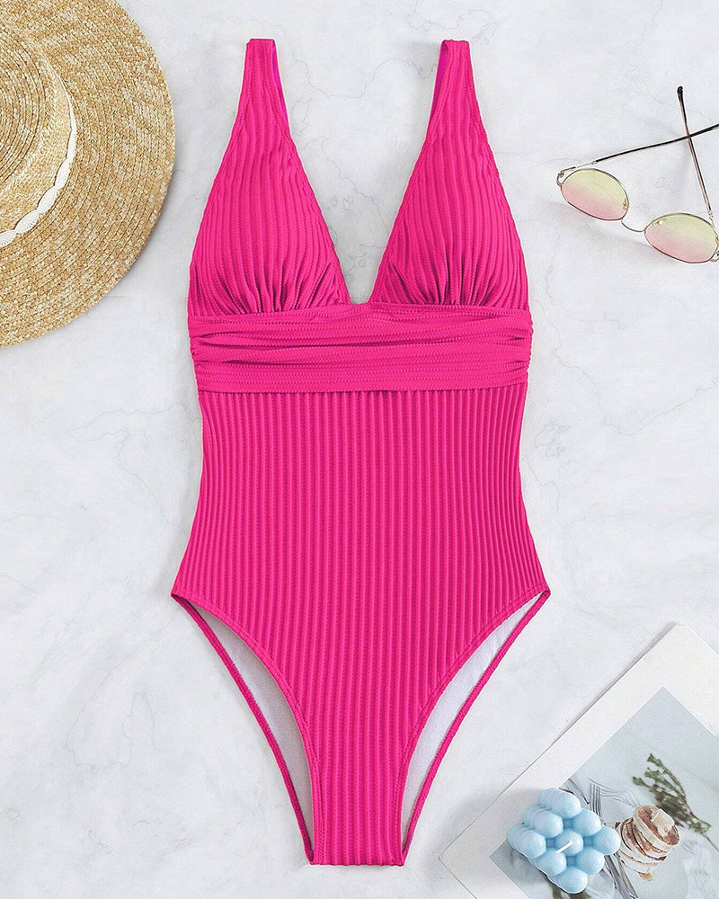 Comfortable solid ribbed one-piece women's swimsuit; V-neck, backless, for beach holiday.