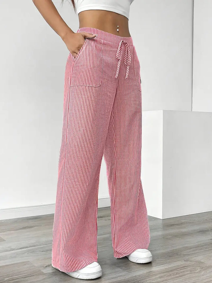 Women's versatile striped wide leg pants, great for elegant or casual looks.