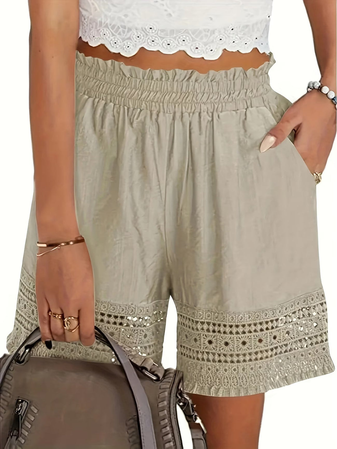 Women's elegant lace trim slant pocket shorts, perfect for stylish summer casual wear.