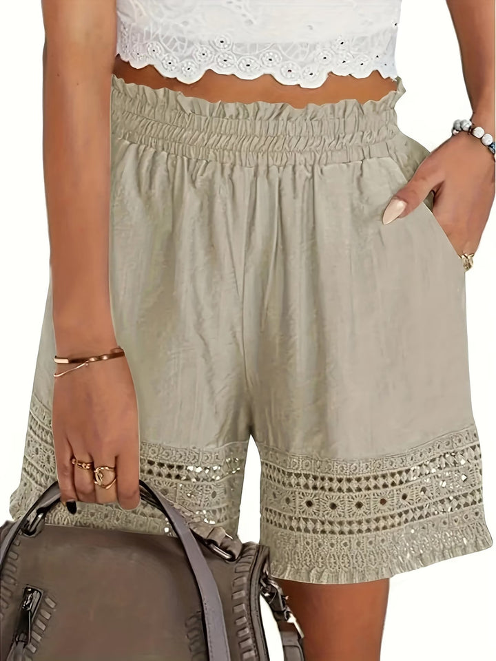 Women's elegant lace trim slant pocket shorts, perfect for stylish summer casual wear.