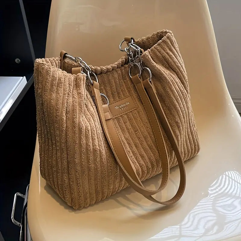 Stylish corduroy shoulder bag for women, a chic handbag accessory for everyday carry & casual elegance.