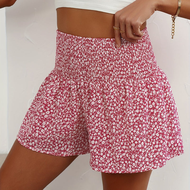 Summer essential: women's lightweight floral shorts with an elastic waist for vacation comfort.