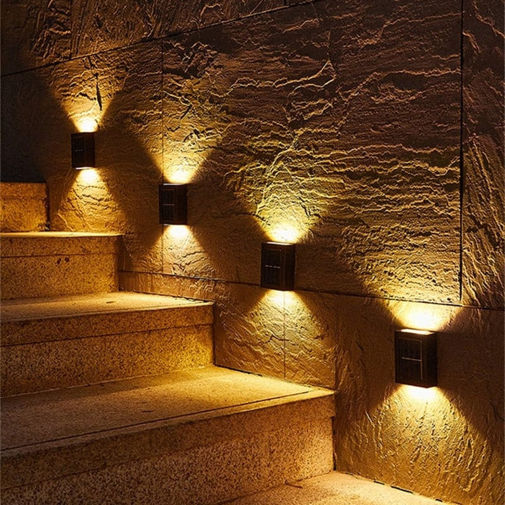 Eco-friendly outdoor solar wall light with modern design, emits warm glow, weather-resistant for gardens and patios.