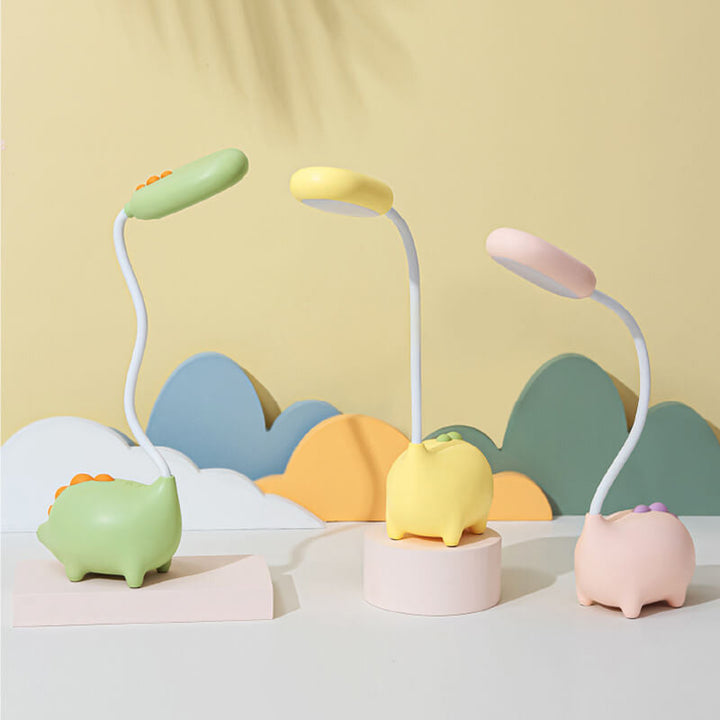 Eco-friendly T-Rex LED desk light for kids; whimsical dino shape, adjustable neck, soft eye-caring light; available in yellow
