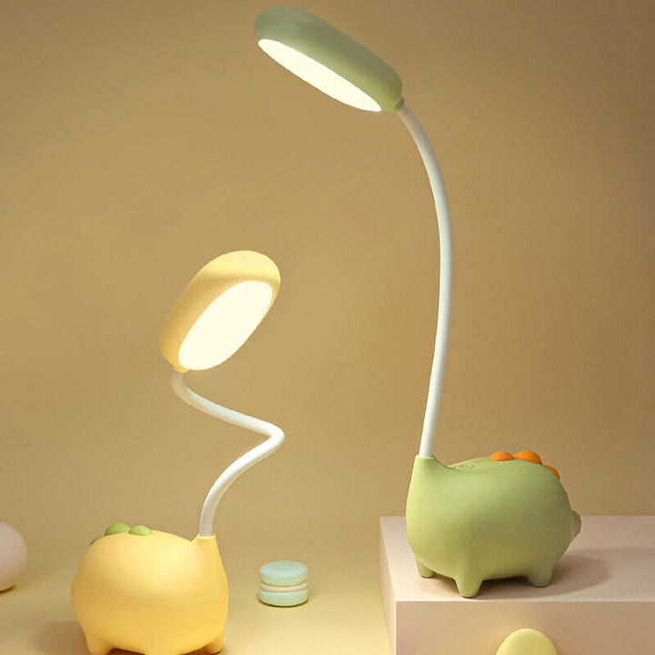 Eco-friendly T-Rex LED desk light for kids; whimsical dino shape, adjustable neck, soft eye-caring light; available in yellow