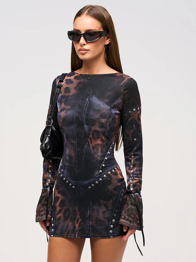 Women's long sleeve gothic mini dress with striking leopard gradient print. Ideal for edgy party or festival fashion.