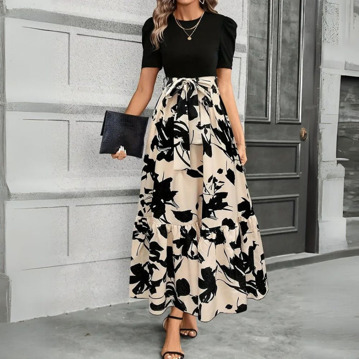 Women's flowy botanical print maxi sundress, perfect for summer vacations & elegant casual wear.