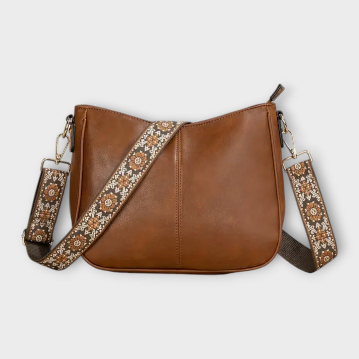 Eco-friendly vegan tote bag for women, chic and practical fashion accessory. Available in brown, white, and black.