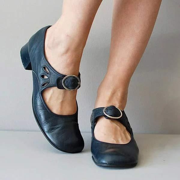 Elegant black low heel pumps for women, perfect for all-day comfort and versatile office wear. Classic slip-on style.