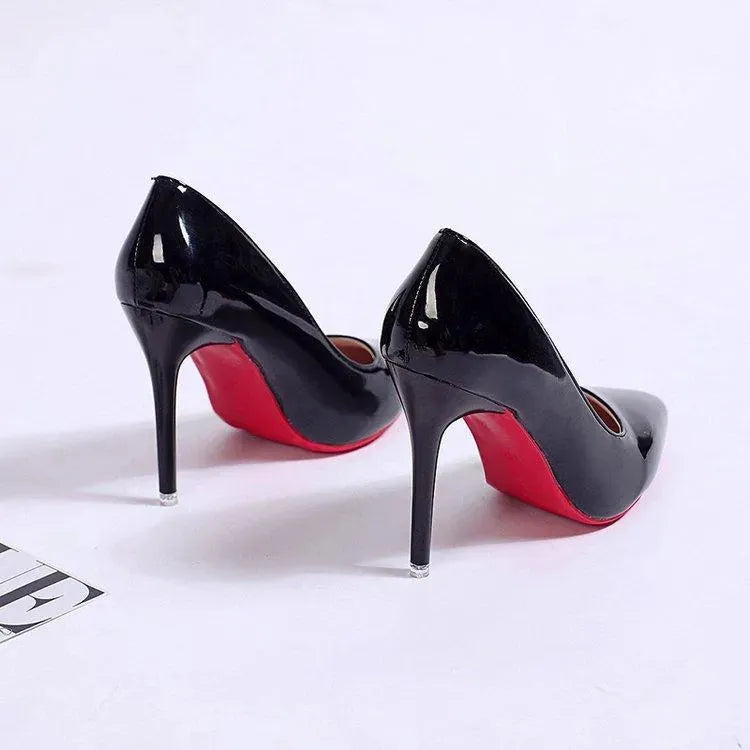 Chic black stiletto heels, elegant dress pumps for women, perfect for fashion-forward style.