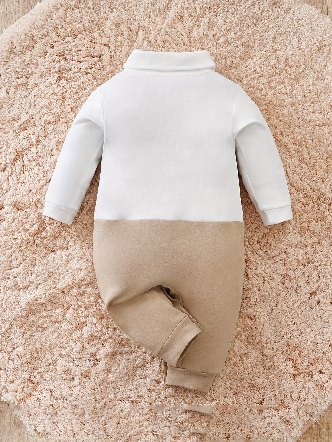 Soft cotton baby romper with a smart bow tie. Comfortable boys' special occasion outfit.