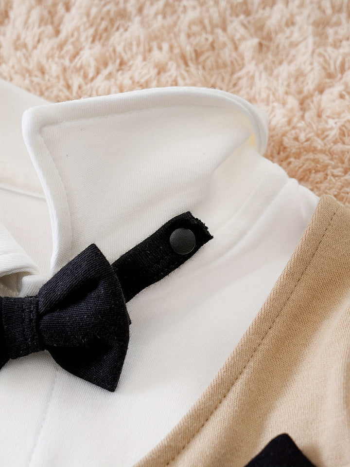 Smart and comfy boys' bow tie romper. Elegant cotton infant outfit for any special day.