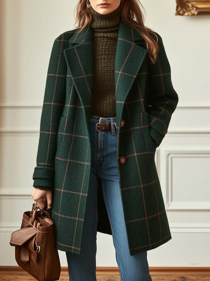Elegant dark green plaid women's mid-length winter coat with a double-breasted front and notched lapels.
