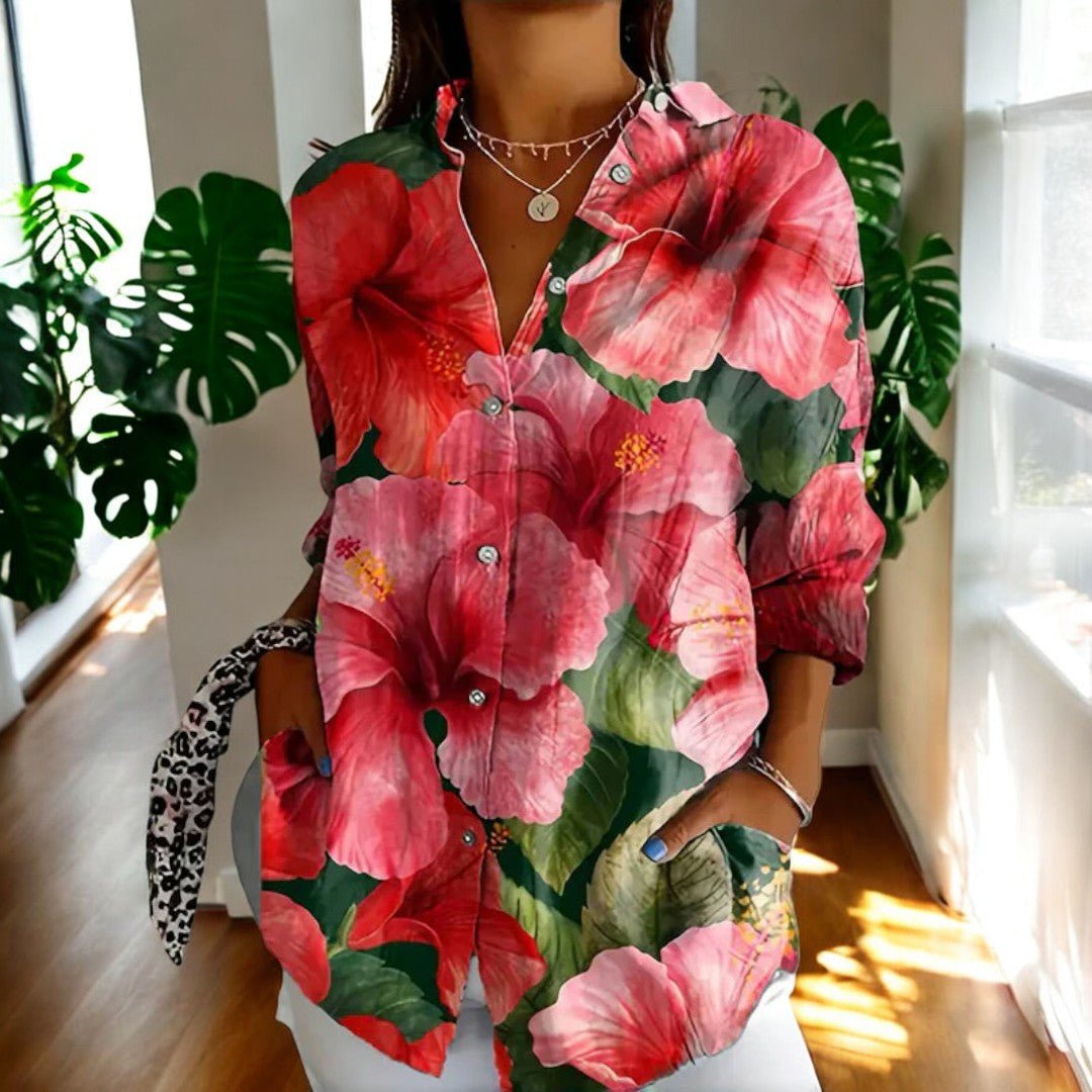 Elegant floral vintage blouse for women. Classic, comfortable, and versatile fashion.
