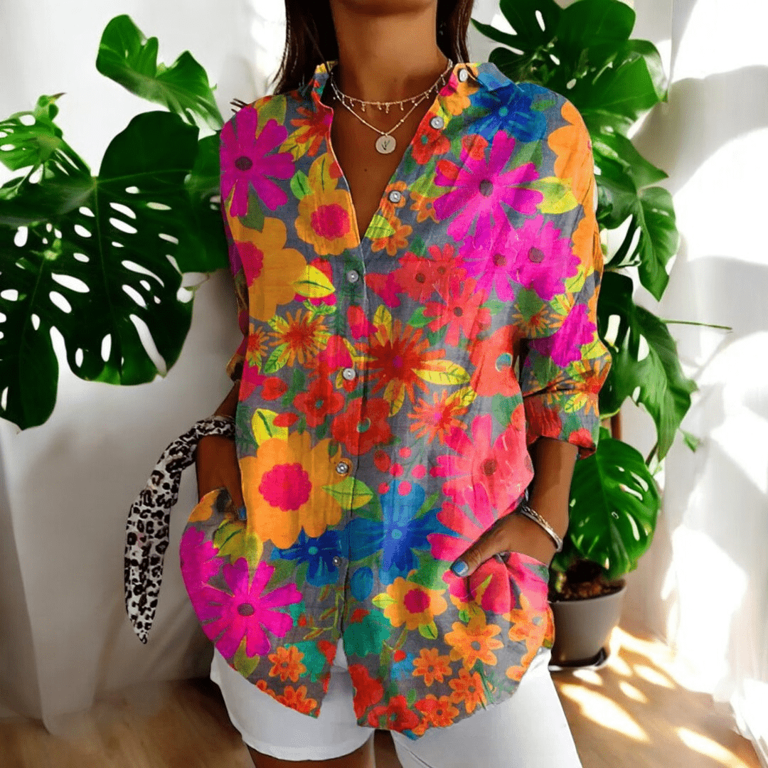 Beautiful women's elegant floral vintage blouse. Offers comfort, classic style, and versatile fashion.