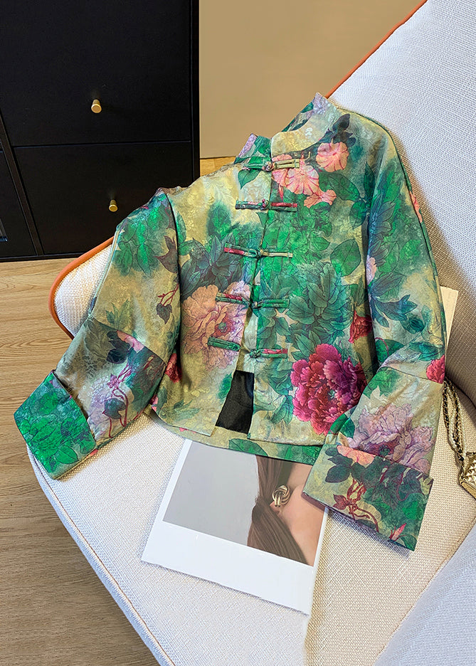 Stylish women's green button coat with intricate Chinese print, perfect elegant outerwear for autumn jacket fashion.