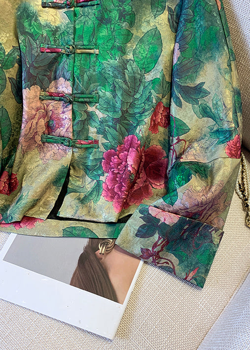 Comfortable elegant green women's coat, featuring a stunning Chinese print and unique button closure for fall.