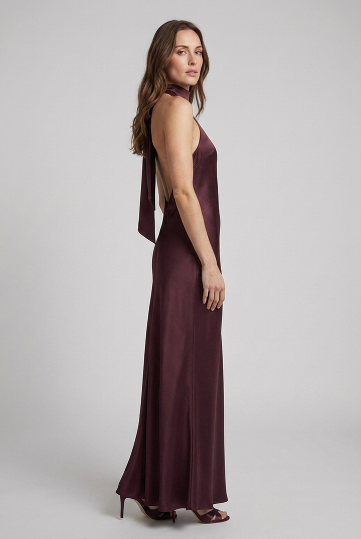 Sleeveless women's halterneck maxi dress, a chic and elegant long gown for special occasions.