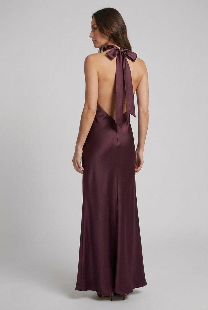 Beautiful women's elegant halterneck maxi dress, ideal formal wear for wedding guests or cocktail parties.