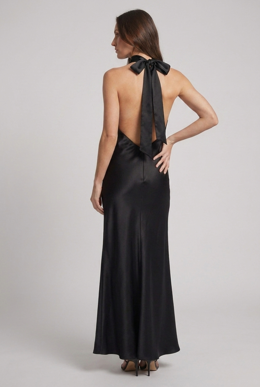 Chic women's halterneck maxi evening dress, an elegant formal gown perfect for wedding guests.