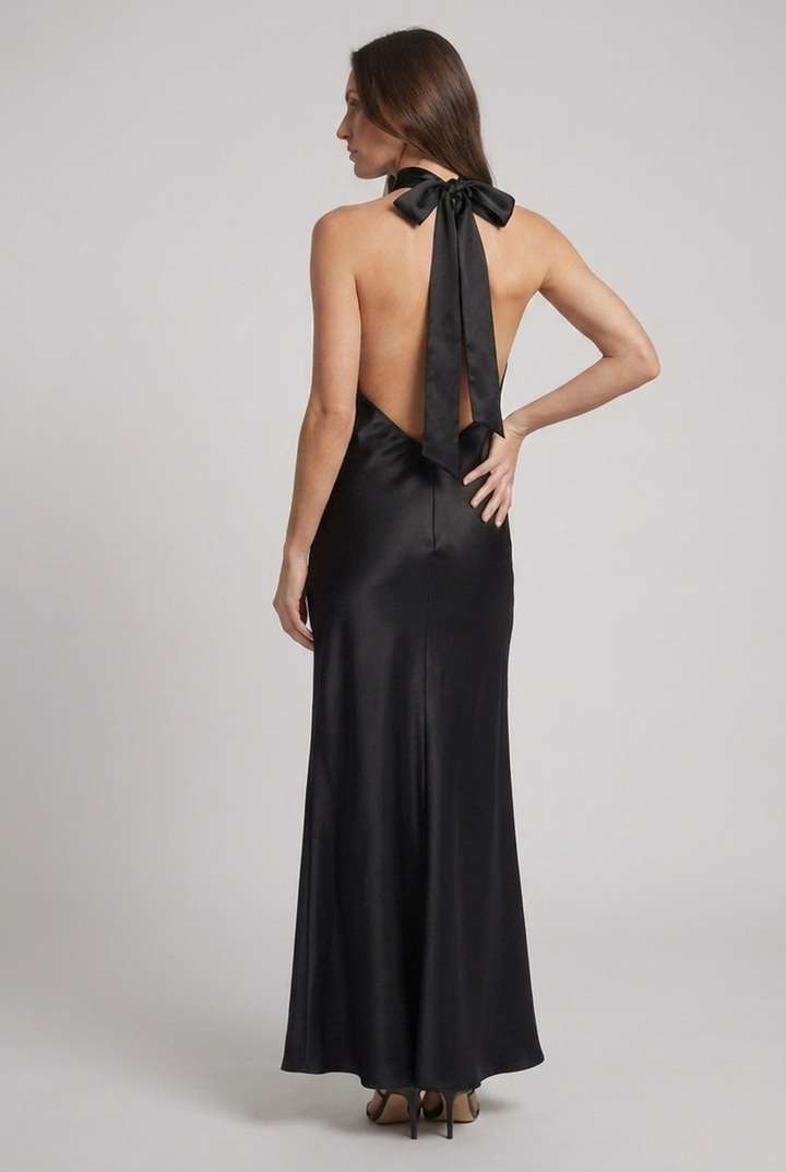 Chic women's halterneck maxi evening dress, an elegant formal gown perfect for wedding guests.
