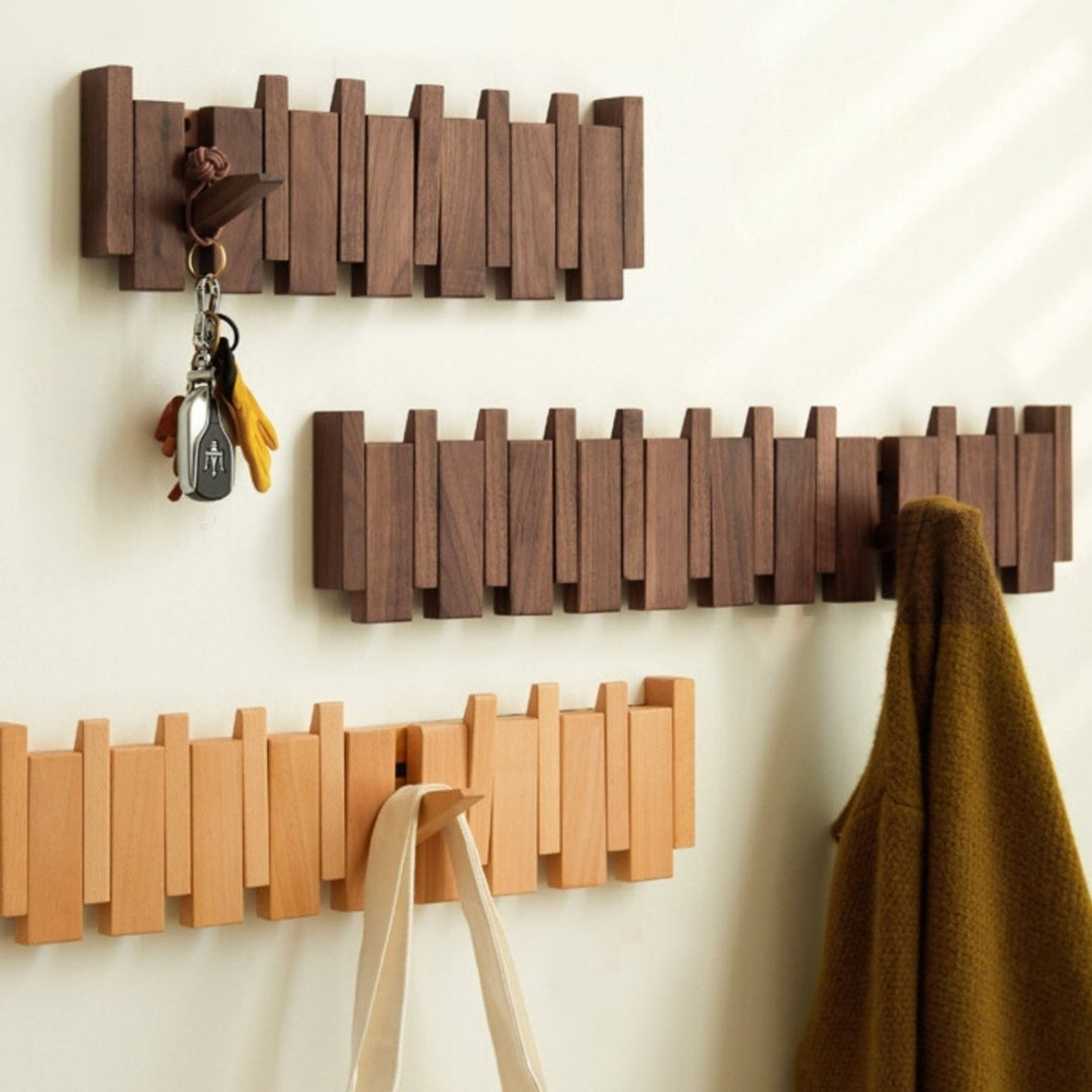 "Elegant handmade wooden piano coatrack front view, showcasing unique piano key design and quality craftsmanship in home deco