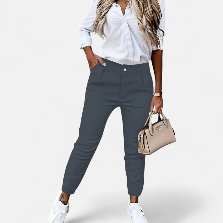 Black high-waist slim-fit women's trousers, a versatile wardrobe essential for elegant & formal styles.