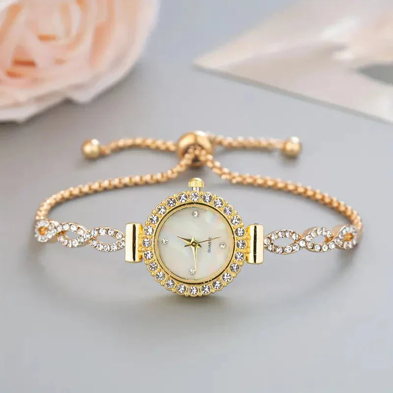 Timeless women's silver bracelet watch with sparkling rhinestones, a chic & adjustable accessory.