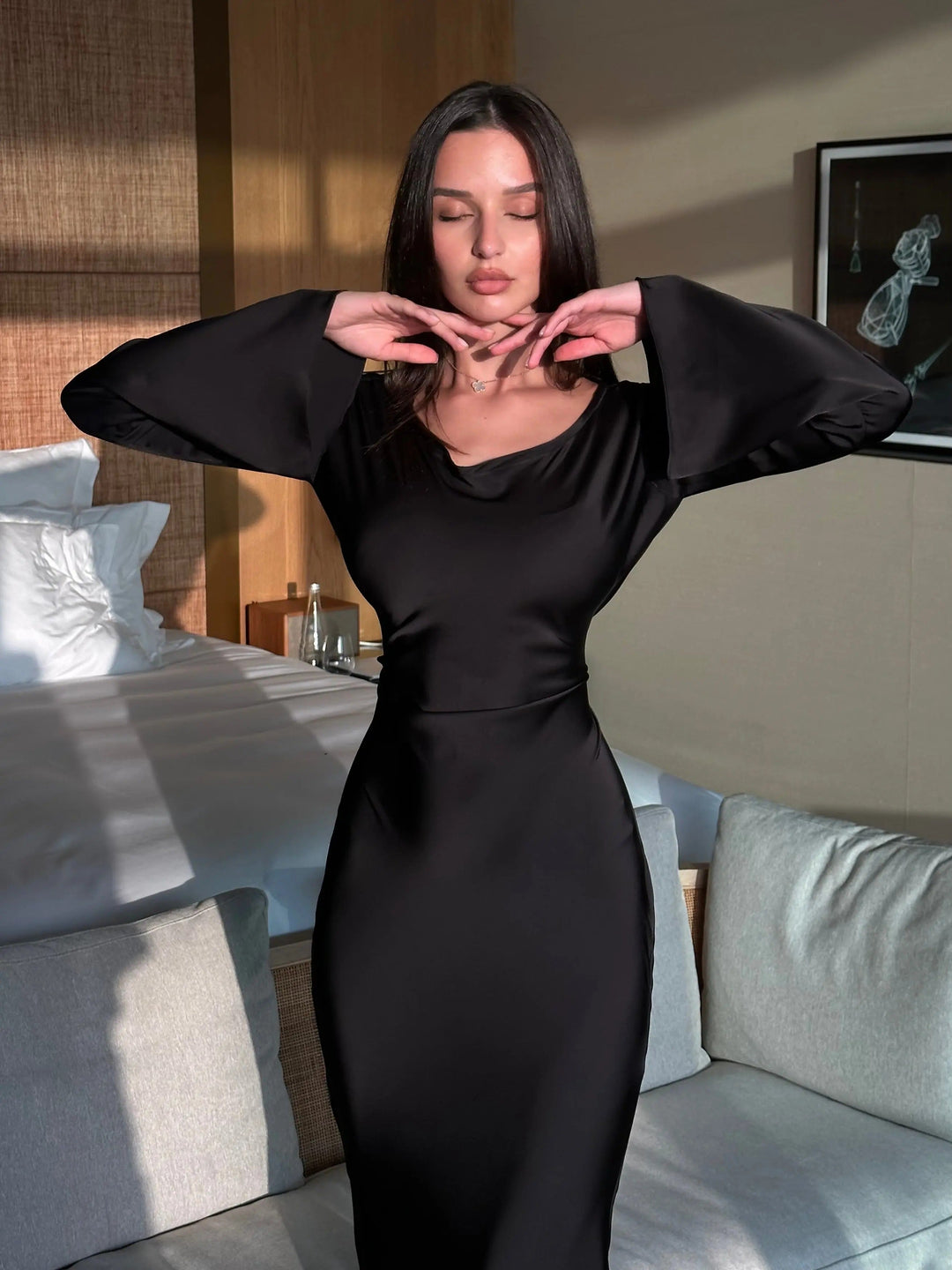 Elegant long sleeve maxi dress for women. Sophisticated wedding guest gown or formal occasion party dress.