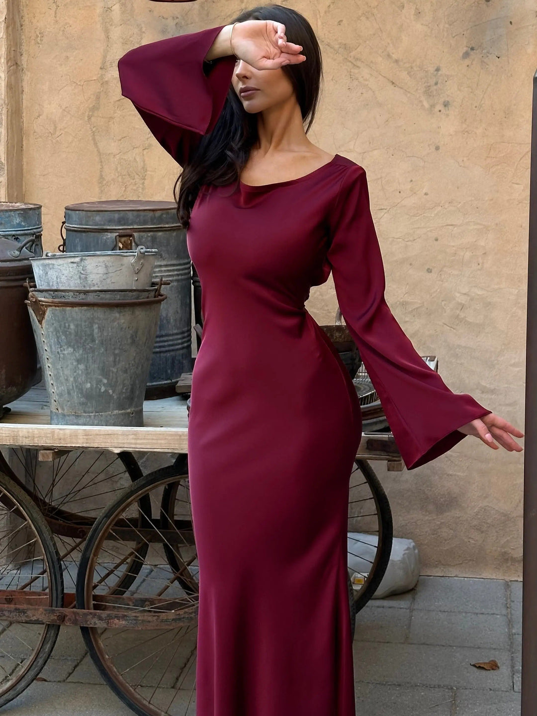 Elegant women's long sleeve maxi dress. Ideal sophisticated evening gown for parties, weddings, and formal events.