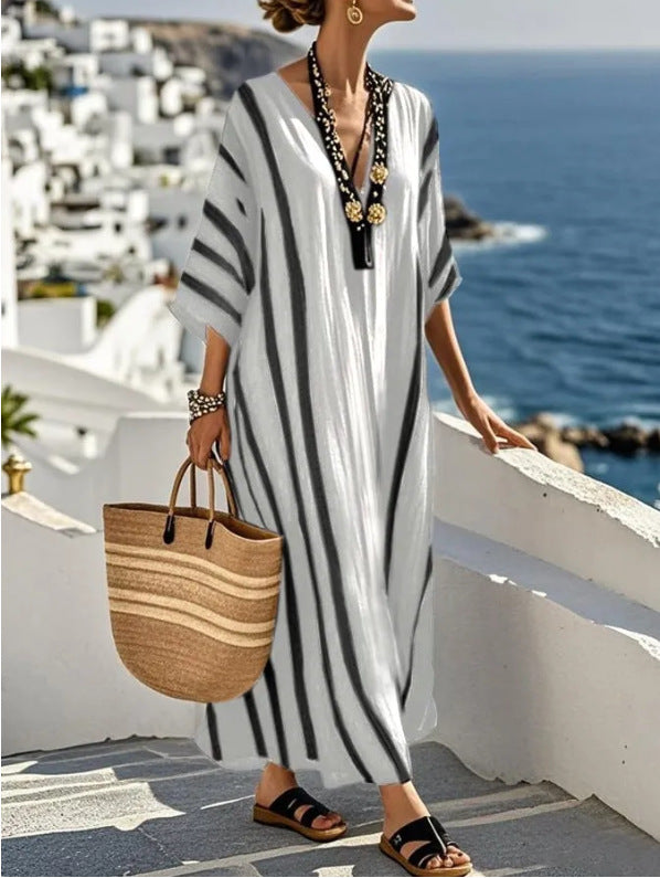 Chic women's flowy kaftan maxi dress with Mediterranean flair, versatile for summer, resort, or casual outings.