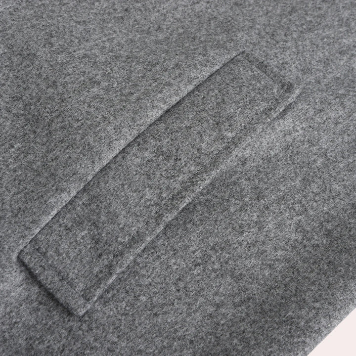 Warm men's button-up winter coat, elegant and regular fit. Essential cold weather outerwear for stylish men.