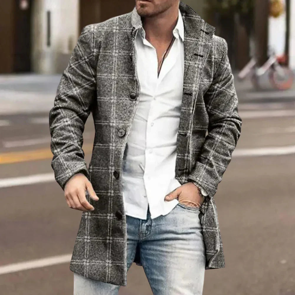 Men's regular fit winter coat featuring a classic button-up closure. Warm and stylish for cold weather fashion.