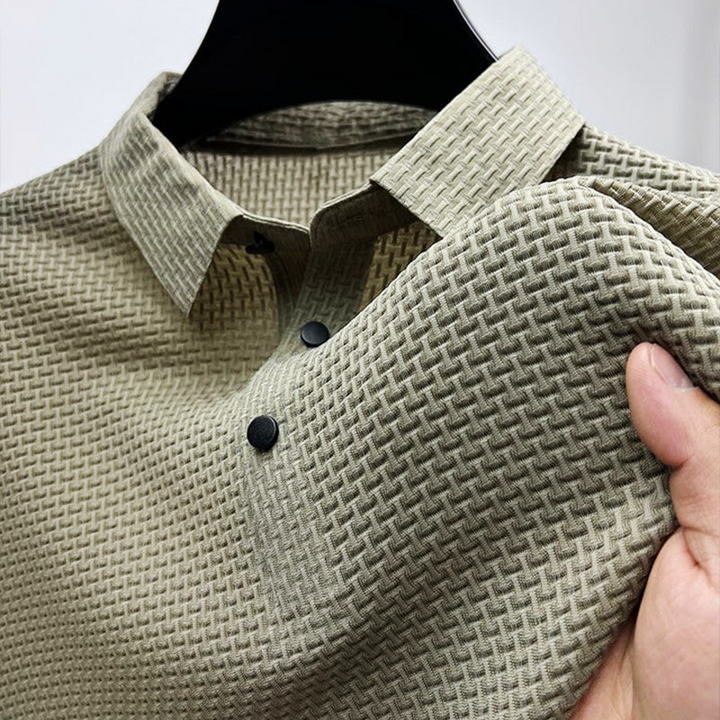 "Elegant men's polo shirt, summer-ready, sleek design in soft, breathable fabric for a stylish, sophisticated look."