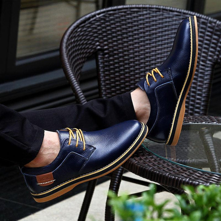 "Elegant men's premium leather Oxford dress shoes, classic formal wear with polished look, ideal for business attire."