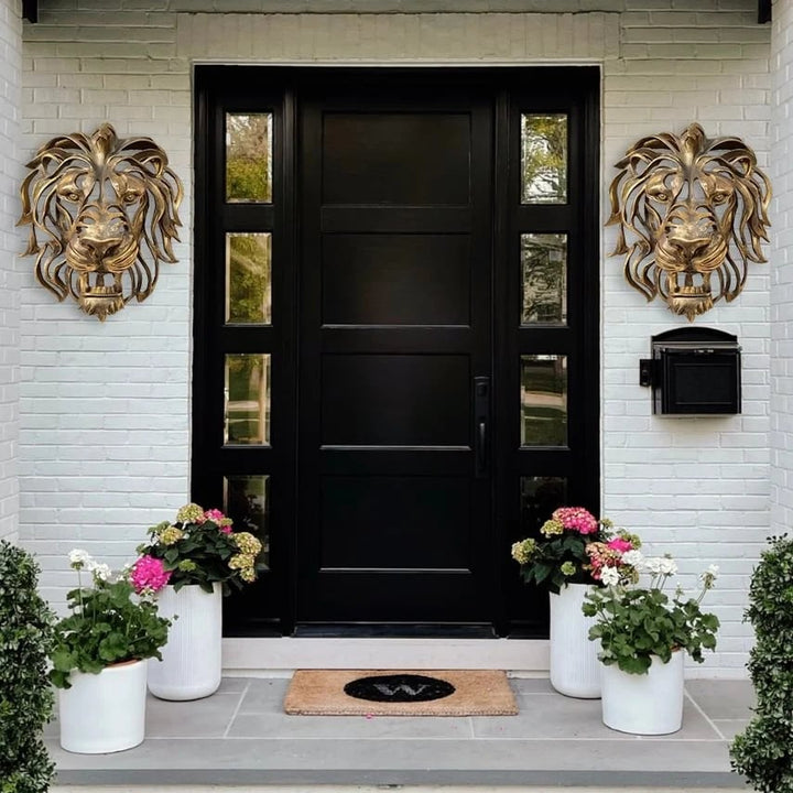 Versatile metal lion head wall decor, an elegant, strong art piece for home or garden enhancement.