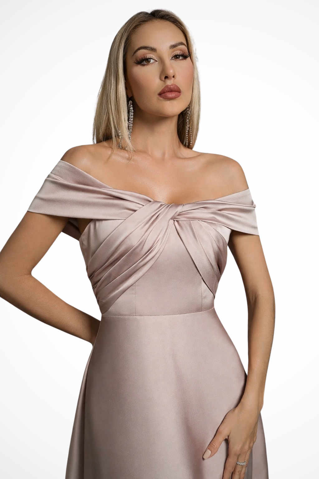 Evening dress: dark green off-shoulder pleated maxi with a sophisticated twisted knot.